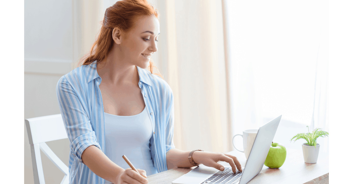 lady smiling and reading emails to make quick money in one day