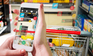 woman holding phone to check out the rocery list app