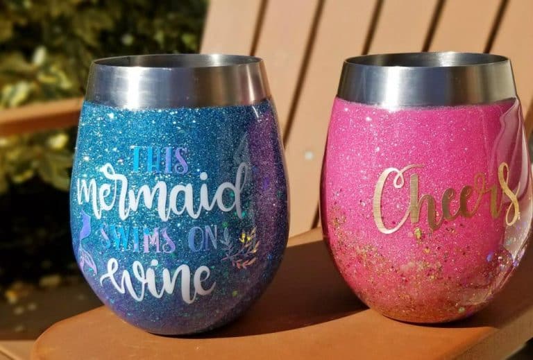 a blue and pink glitter tumbler