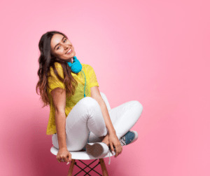 Girl on chair wondering how to make money as a teenager