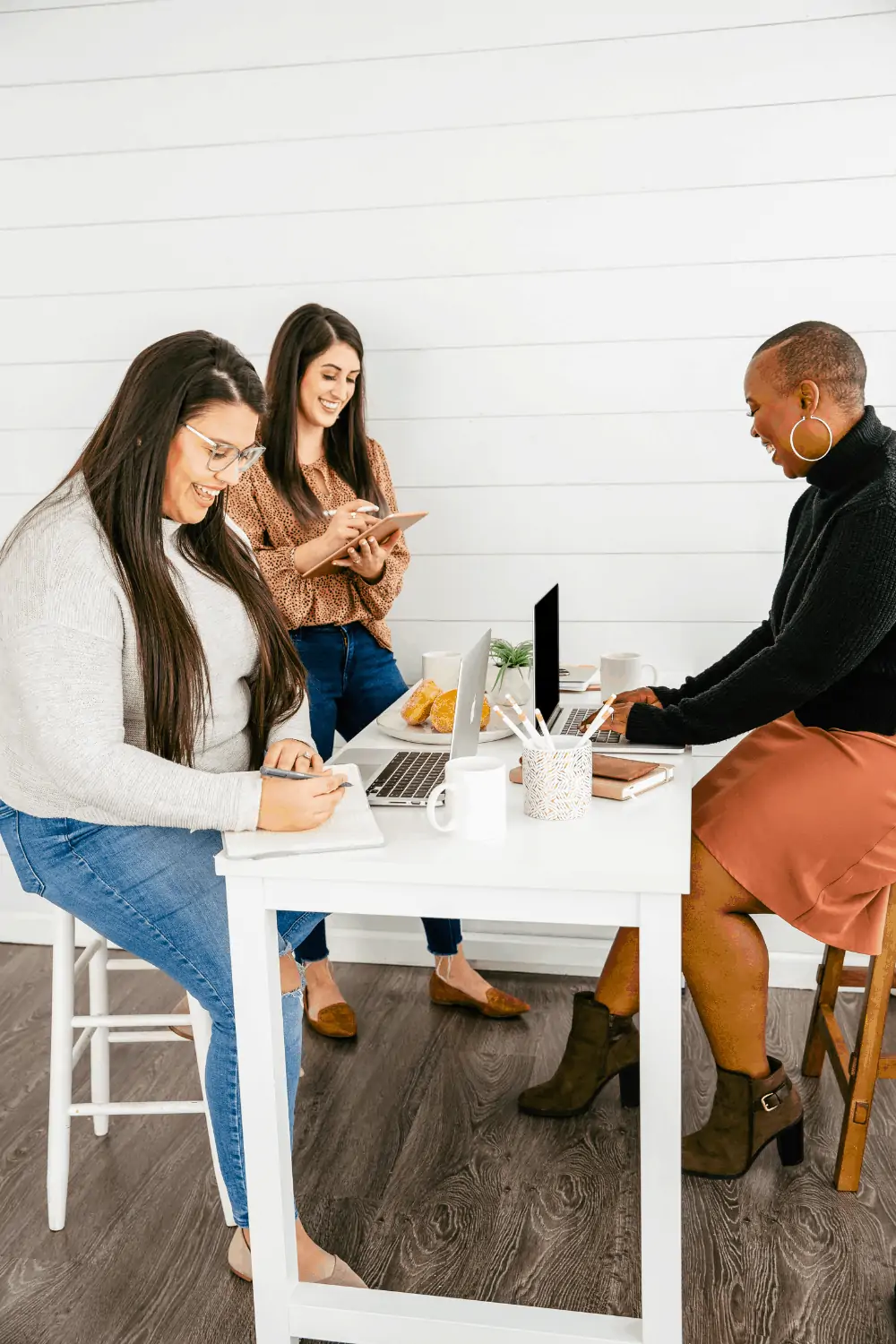 women searching for online typing jobs from home using a laptop.