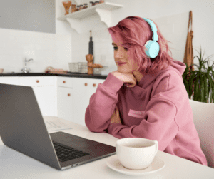 girl on laptop wanting to get paid to watch videos