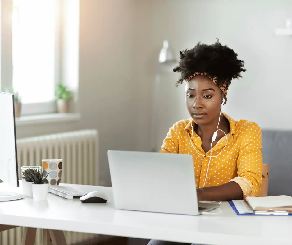 woman listening to audio for her online typing job.